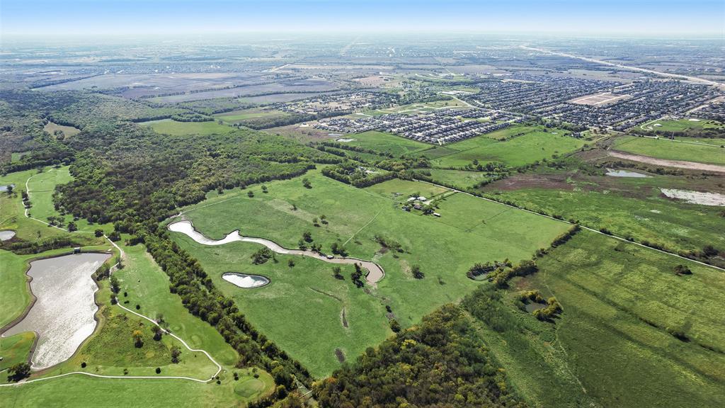 1396 Cemetery Road Royse City, TX 75189 - Photo 5 of 10 an aerial view of a residential houses with outdoor space and trees