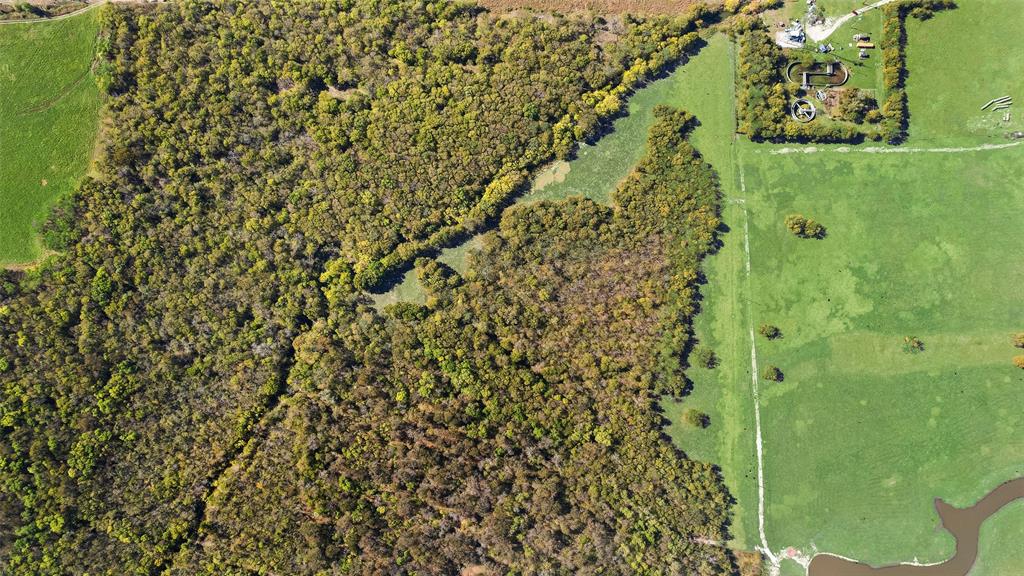 1396 Cemetery Road Royse City, TX 75189 - Photo 9 of 10 a bathroom with a shower curtain and a sink