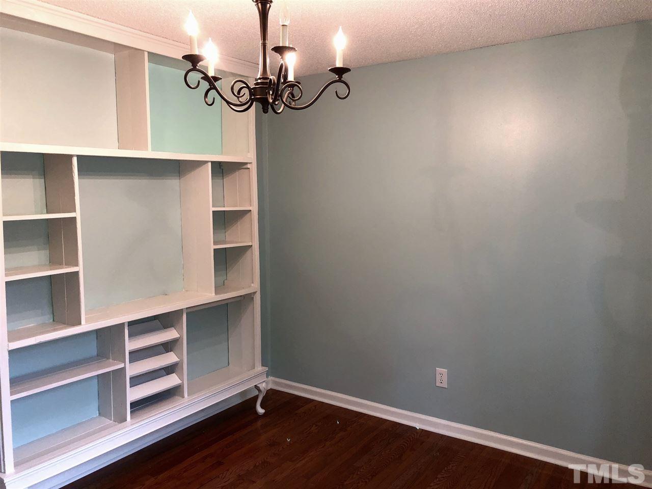 2108 Ruddy Road Raleigh, NC 27616 - Photo 14 of 19 a view of a room with shelf on the wall