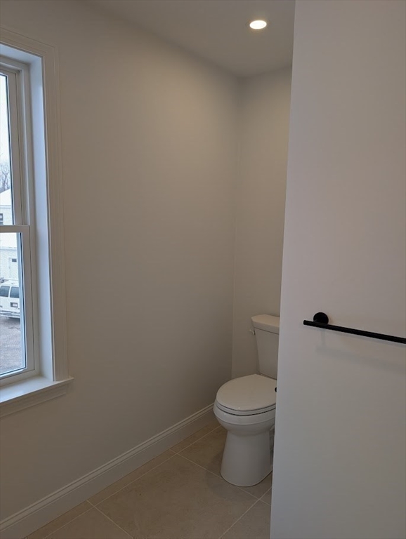 778 Main Street, Unit 6 Leicester, MA 01524 - Photo 18 of 39 a white toilet sitting next to a window