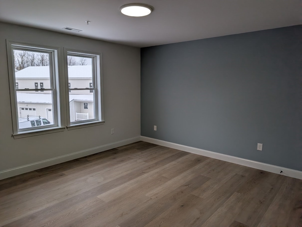 778 Main Street, Unit 6 Leicester, MA 01524 - Photo 24 of 39 an empty room with a window