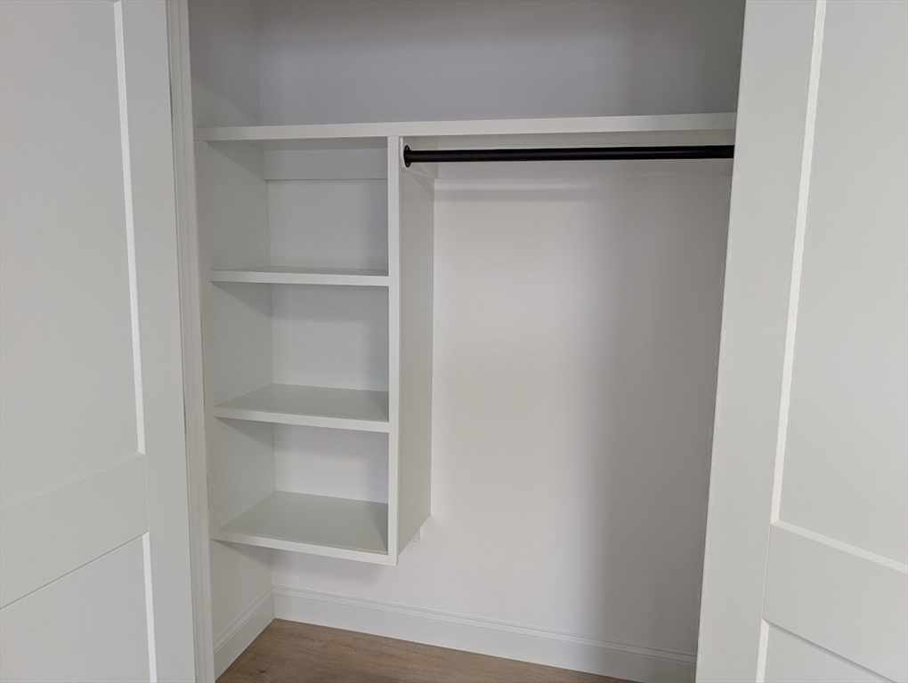 778 Main Street, Unit 6 Leicester, MA 01524 - Photo 29 of 39 a view of an empty walk in closet