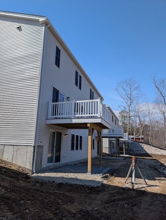 778 Main Street, Unit 6 Leicester, MA 01524 - Photo 36 of 39 a front view of a house with a yard