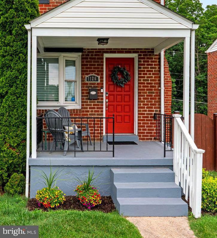 1126 Elm Road Baltimore, MD 21227 - Photo 2 of 30 Covered entry and a room to rest
