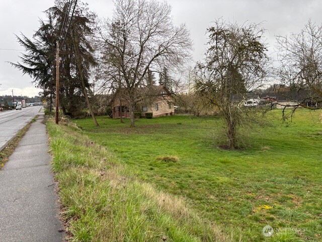 1887 South Market Boulevard Chehalis, WA 98532 - Photo 1 of 16 a big yard with lots of green space and trees