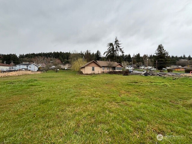 1887 South Market Boulevard Chehalis, WA 98532 - Photo 4 of 16 a view of a lake with houses in back
