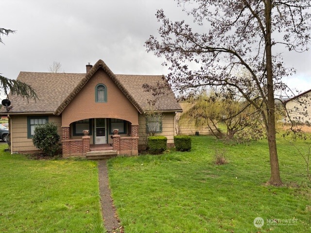 1887 South Market Boulevard Chehalis, WA 98532 - Photo 5 of 16 a view of a house with a yard