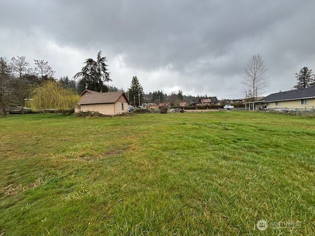 1887 South Market Boulevard Chehalis, WA 98532 - Photo 9 of 16 a view of a room with a big yard and a fountain