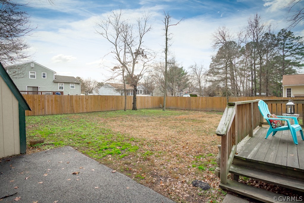 4705 Twelveoaks Road Midlothian, VA 23112 - Photo 19 of 25 a view of backyard with wooden fence