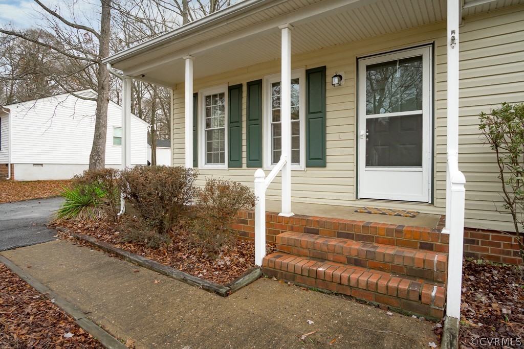 4705 Twelveoaks Road Midlothian, VA 23112 - Photo 4 of 25 front view of a house with a window