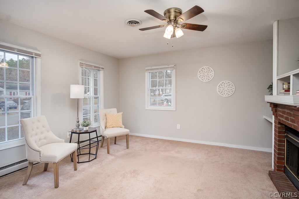 4705 Twelveoaks Road Midlothian, VA 23112 - Photo 6 of 25 a living room with furniture a clock and a window