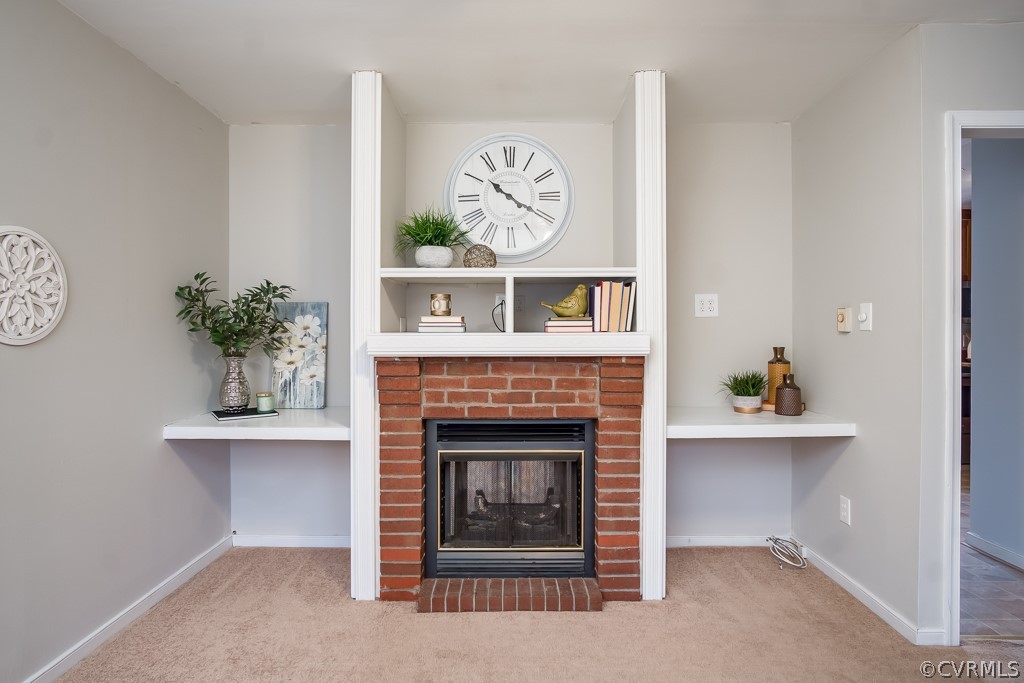 4705 Twelveoaks Road Midlothian, VA 23112 - Photo 8 of 25 a living room with furniture and a fireplace
