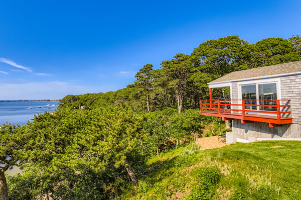 217 Barnes Road Oak Bluffs, MA 02557 - Photo 52 of 60 a view of a house with a backyard