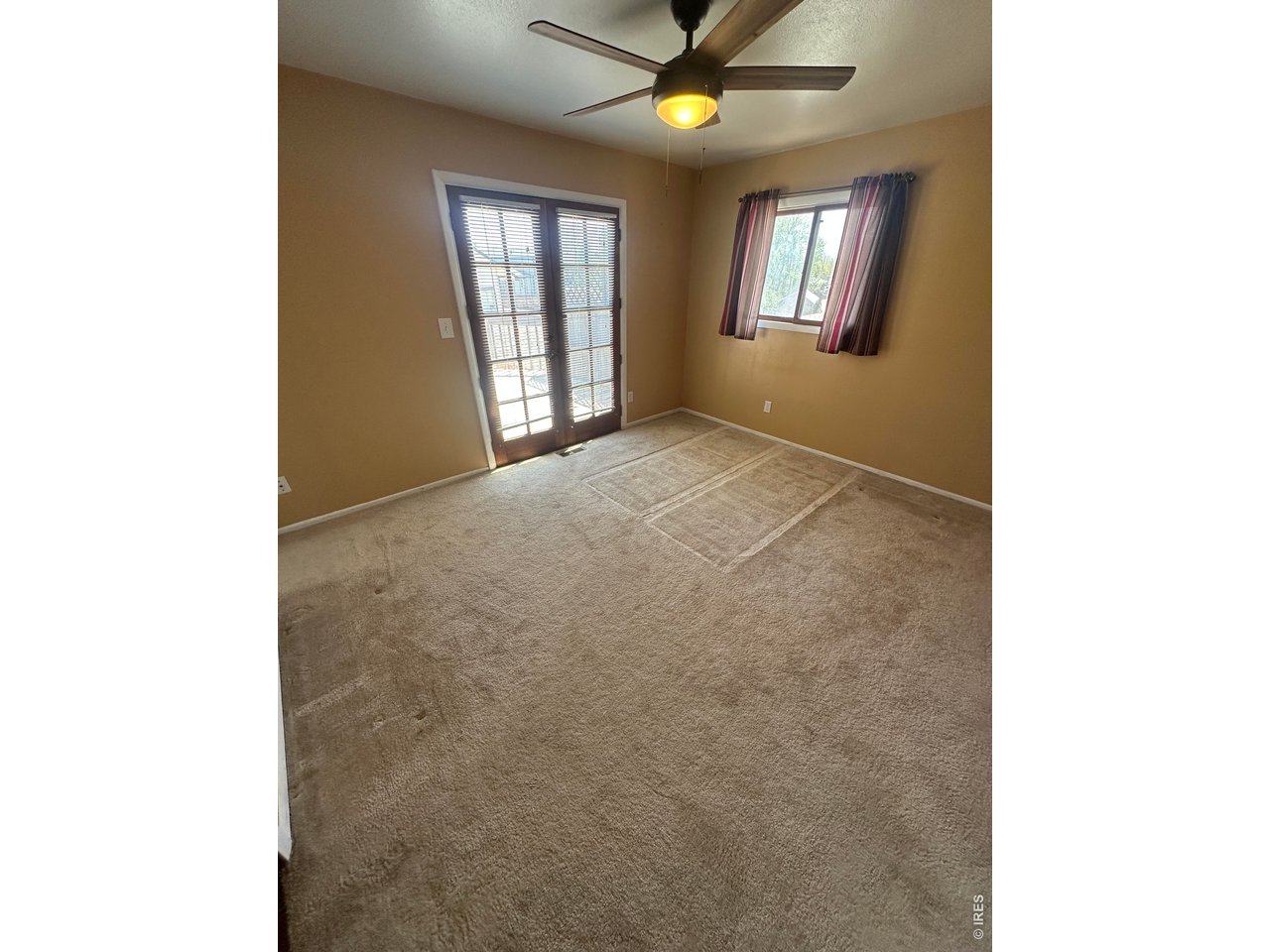 268 Fifth Street Firestone, CO 80520 - Photo 13 of 25 a view of an empty room with a window