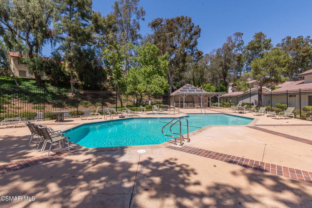 1047 Windmill Lane Oak Park, CA 91377 - Photo 13 of 13 a view of a swimming pool with a patio