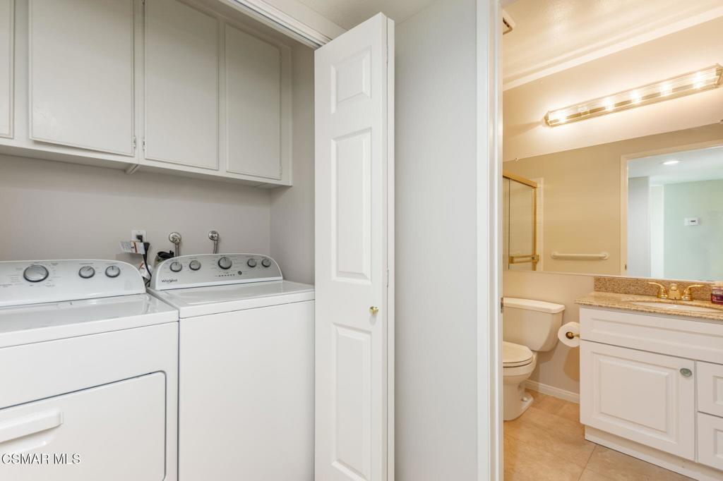 1047 Windmill Lane Oak Park, CA 91377 - Photo 7 of 13 a view of storage and utility room with washer and dryer