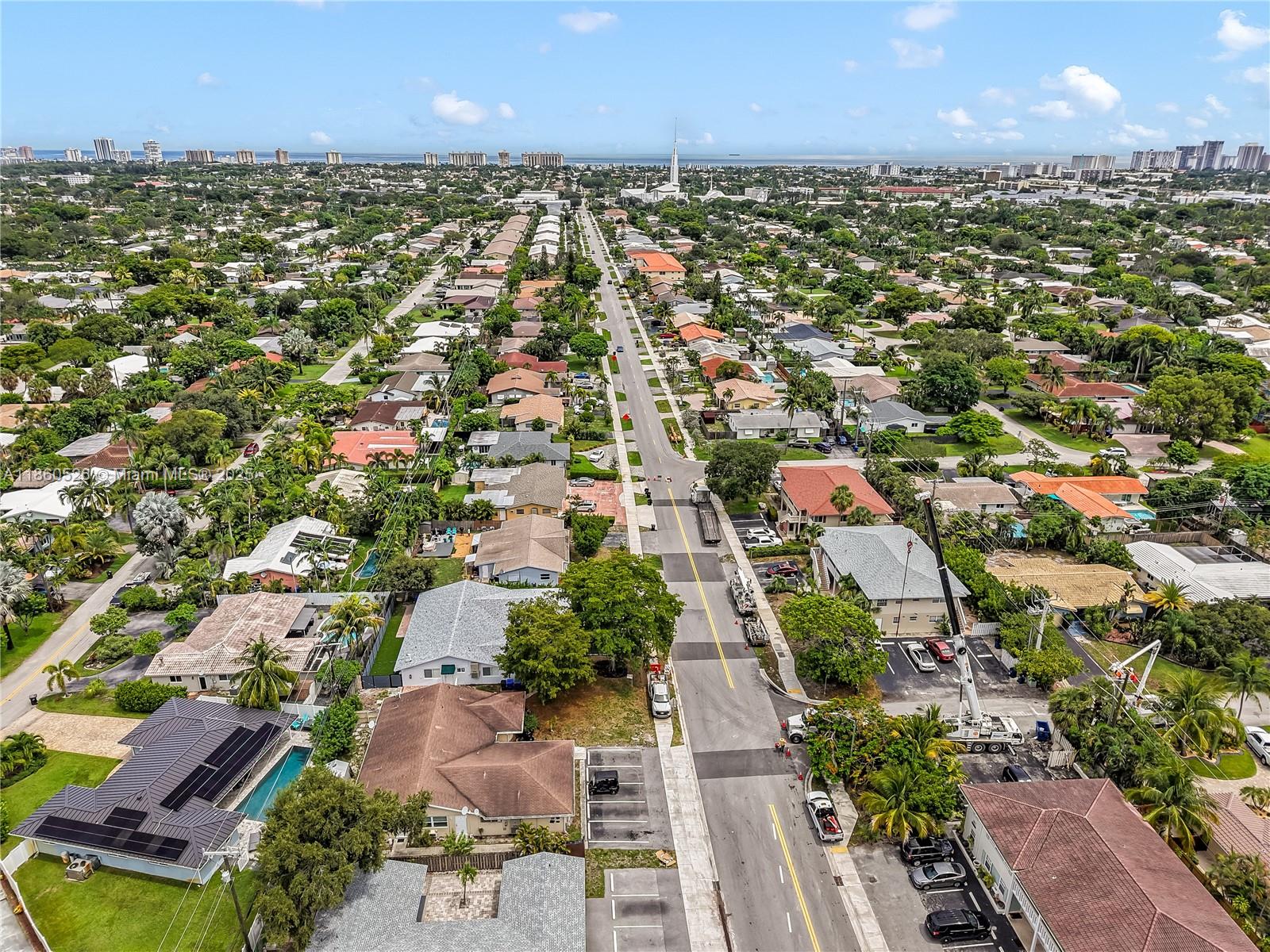 1821 Northeast 56th Street, Unit 4 Fort Lauderdale, FL 33308 - Photo 9 of 9 an aerial view of residential houses with outdoor space