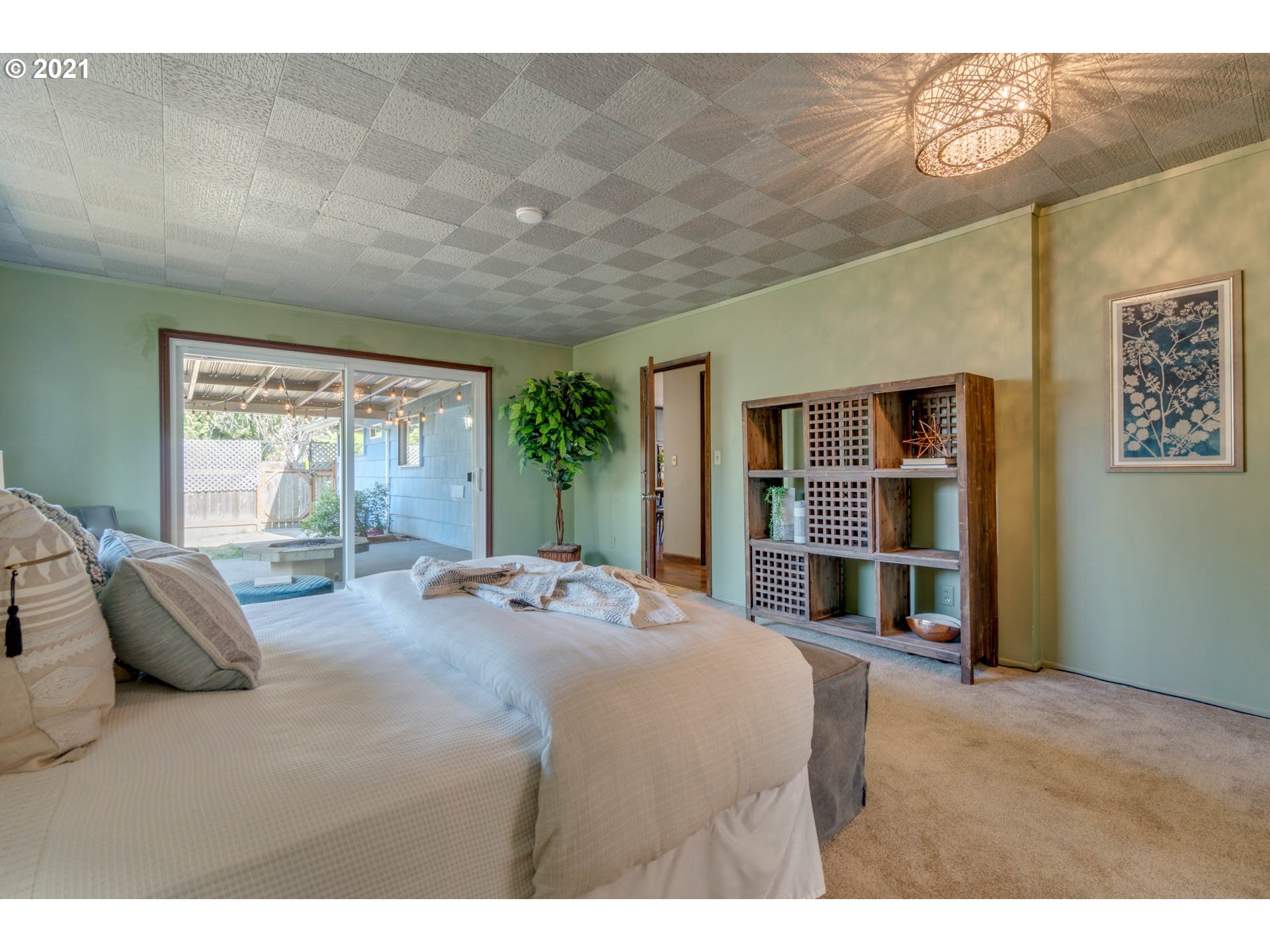 11555 Southwest Denney Road Beaverton, OR 97008 - Photo 12 of 28 a bed room with a bed and wooden floor