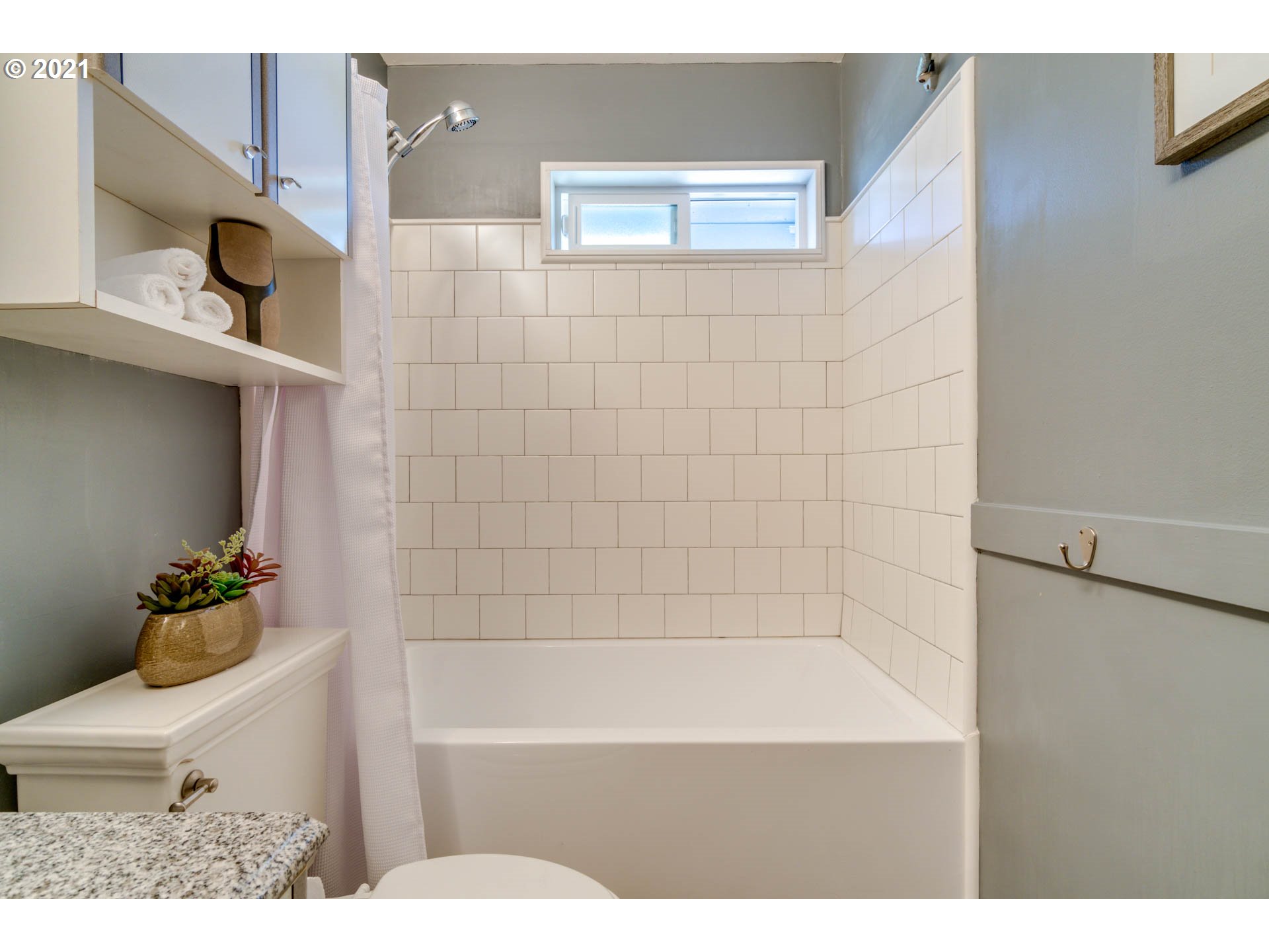 11555 Southwest Denney Road Beaverton, OR 97008 - Photo 19 of 28 a bathroom with a bathtub sink and toilet
