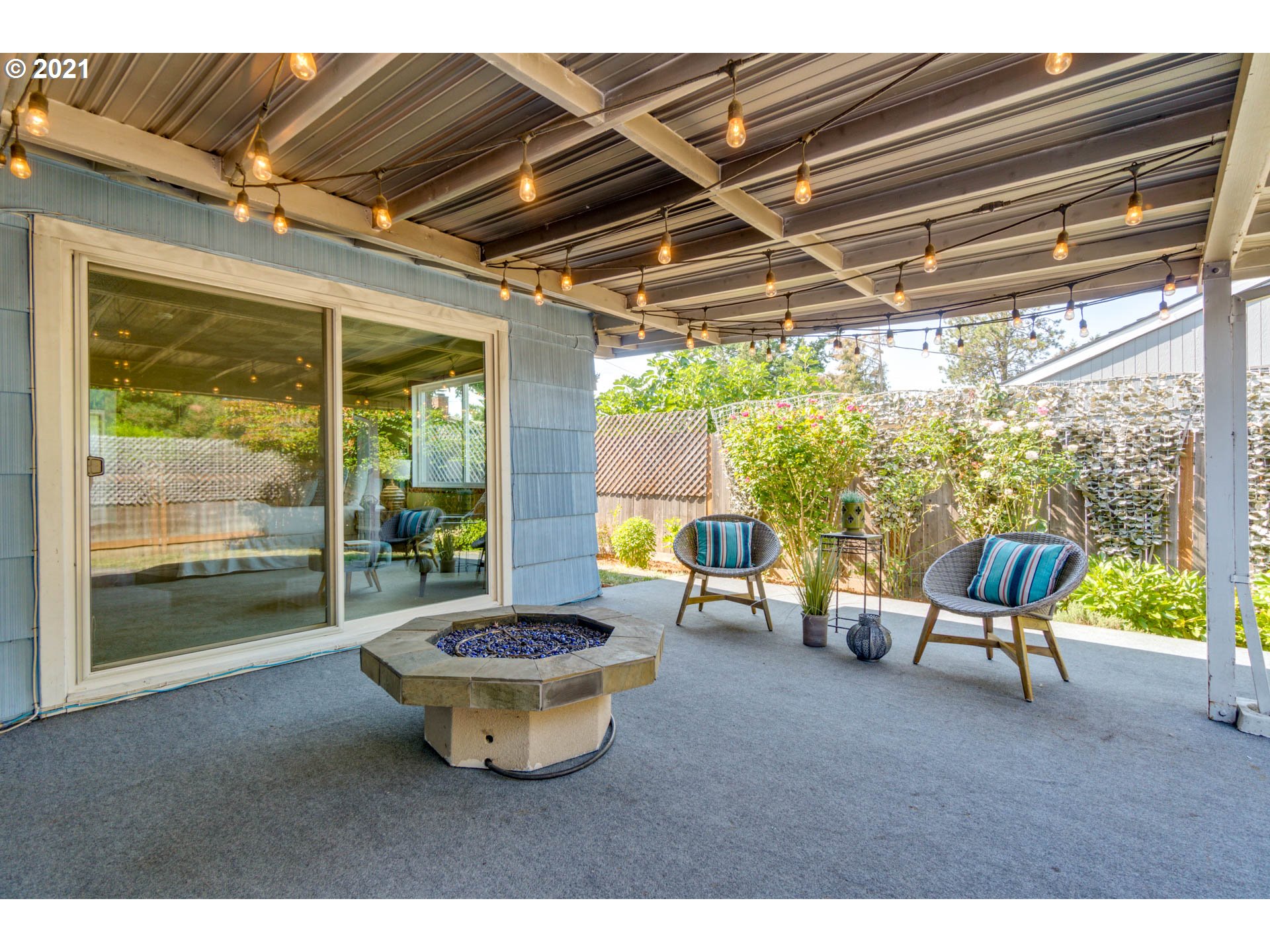 11555 Southwest Denney Road Beaverton, OR 97008 - Photo 24 of 28 a outdoor space with the couches and dining table with the garden view
