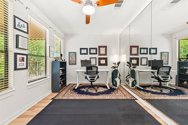 a view of a room with gym equipment