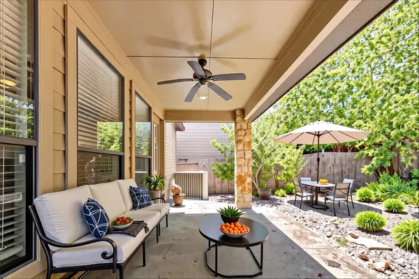 a outdoor space with patio the couches and a potted plant
