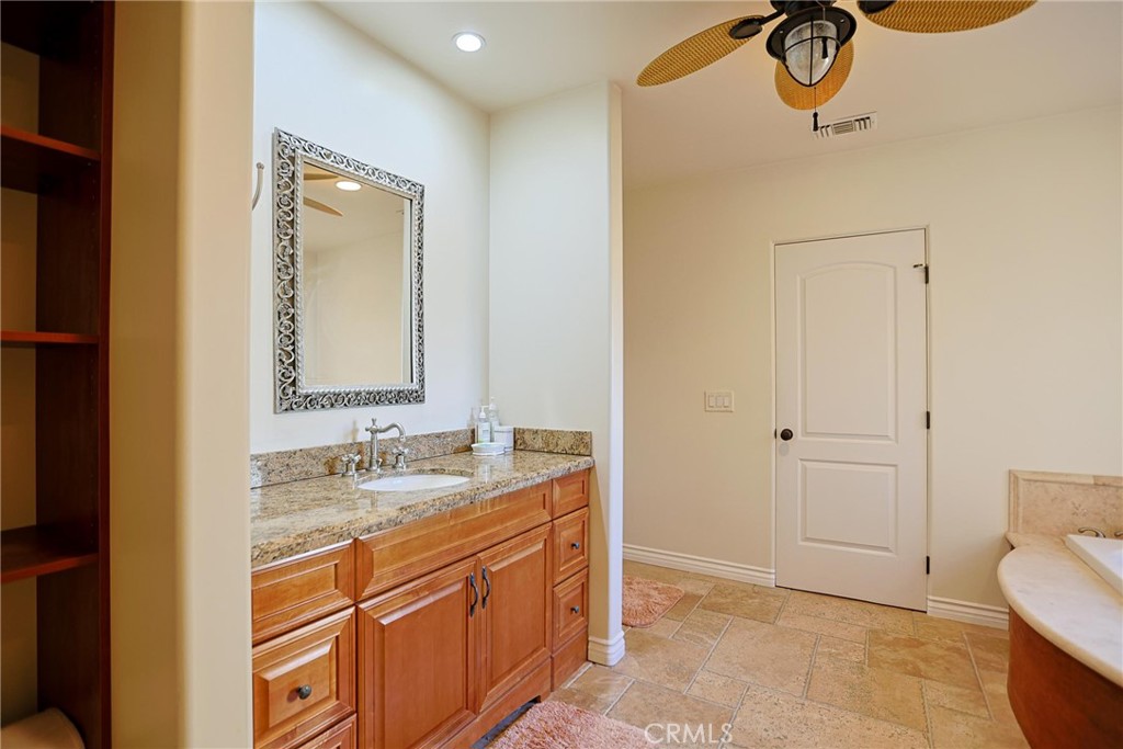 116 Termino Avenue Long Beach, CA 90803 - Photo 19 of 51 a bathroom with a sink and a mirror