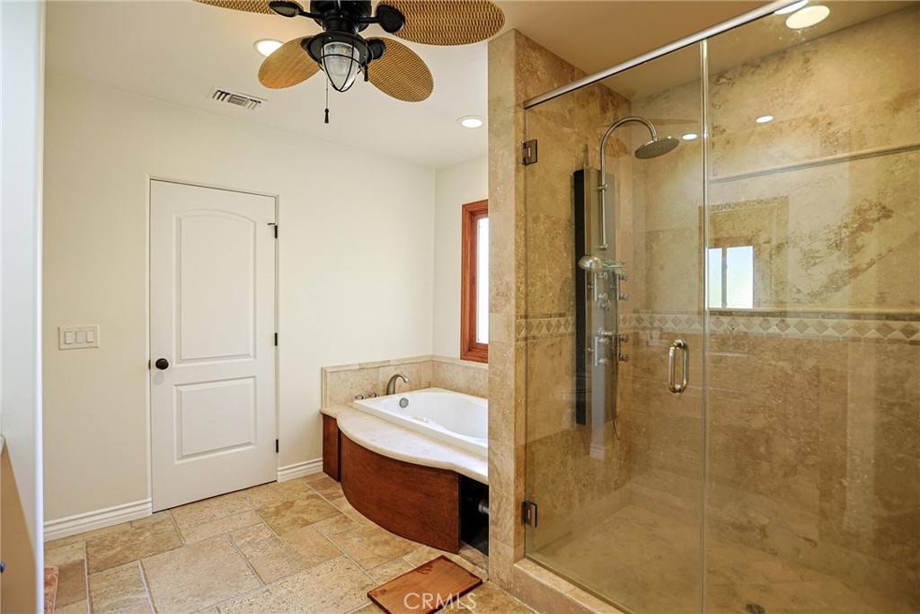 116 Termino Avenue Long Beach, CA 90803 - Photo 20 of 51 a bathroom with a tub shower and sink