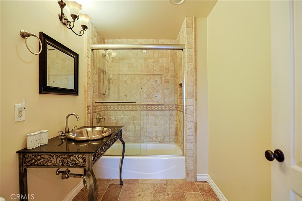 116 Termino Avenue Long Beach, CA 90803 - Photo 29 of 51 a bathroom with a sink and a mirror
