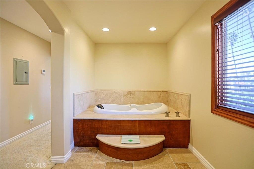 116 Termino Avenue Long Beach, CA 90803 - Photo 34 of 51 a bathroom with a sink and a mirror