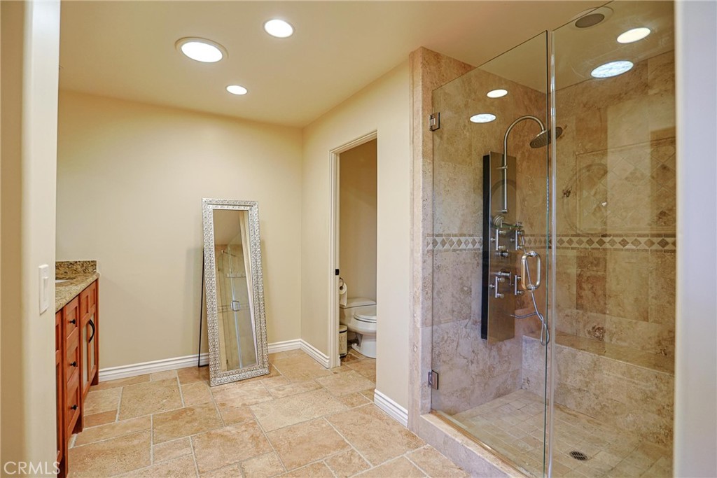 116 Termino Avenue Long Beach, CA 90803 - Photo 35 of 51 a bathroom with a shower and a sink