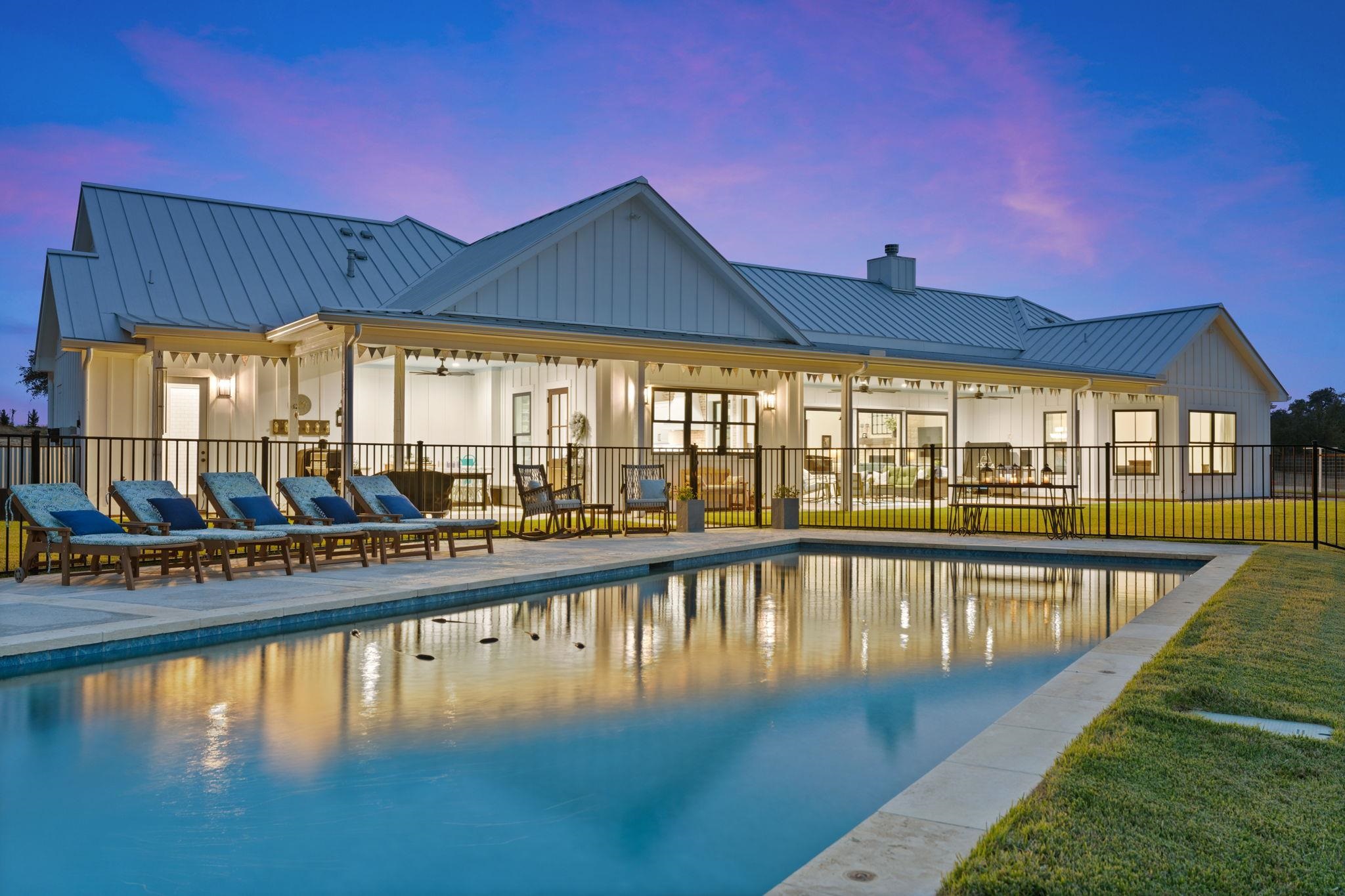 452 Southwick Ranch Road Johnson City, TX 78636 - Photo 1 of 44 a view of a swimming pool with an outdoor seating