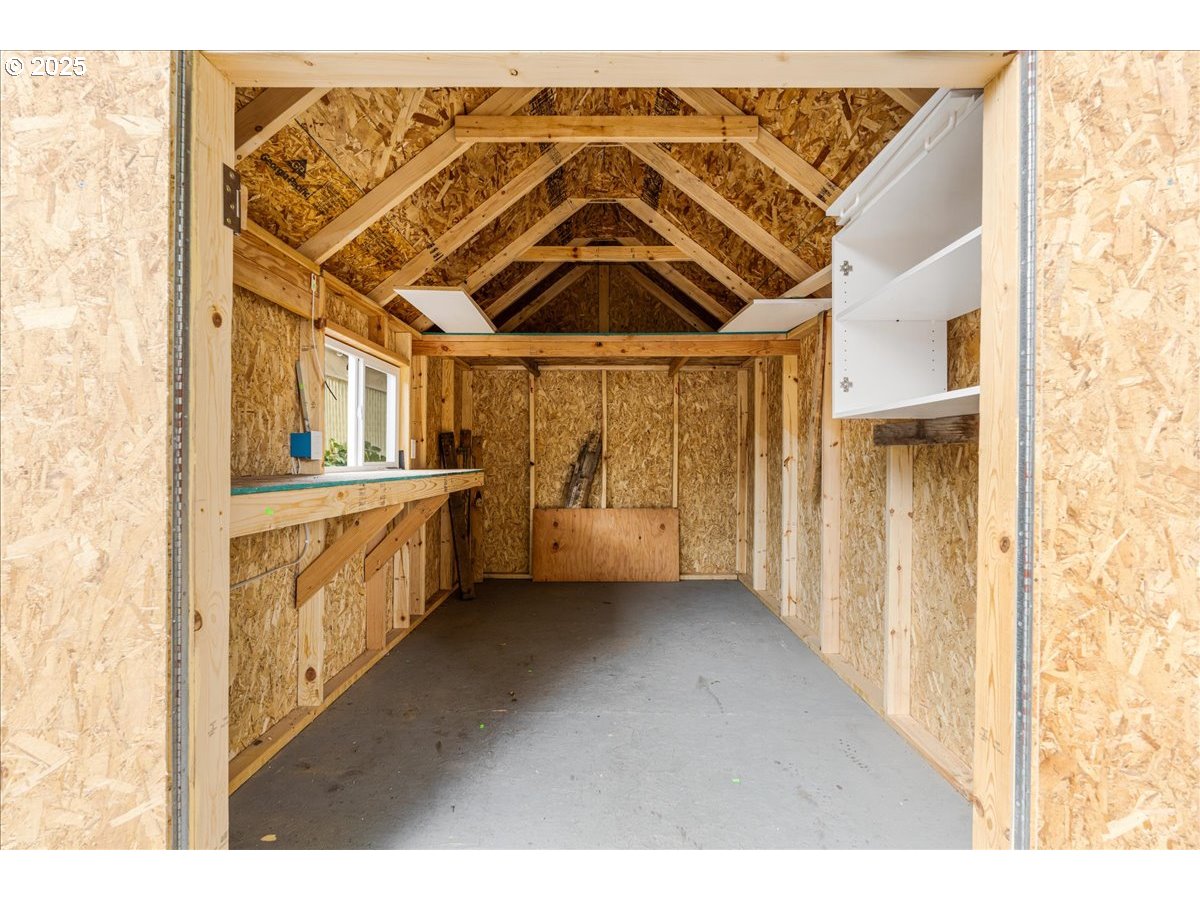 719 South Chehalem Street Newberg, OR 97132 - Photo 25 of 27 a view of a bathroom with a sink and a window