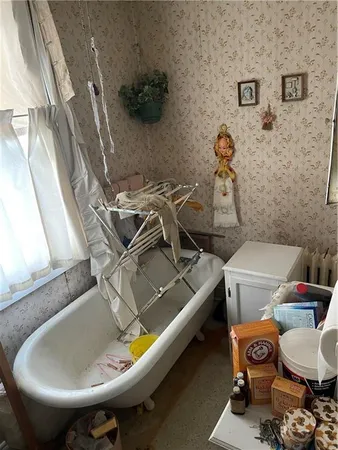 a bathroom with a sink and toilet