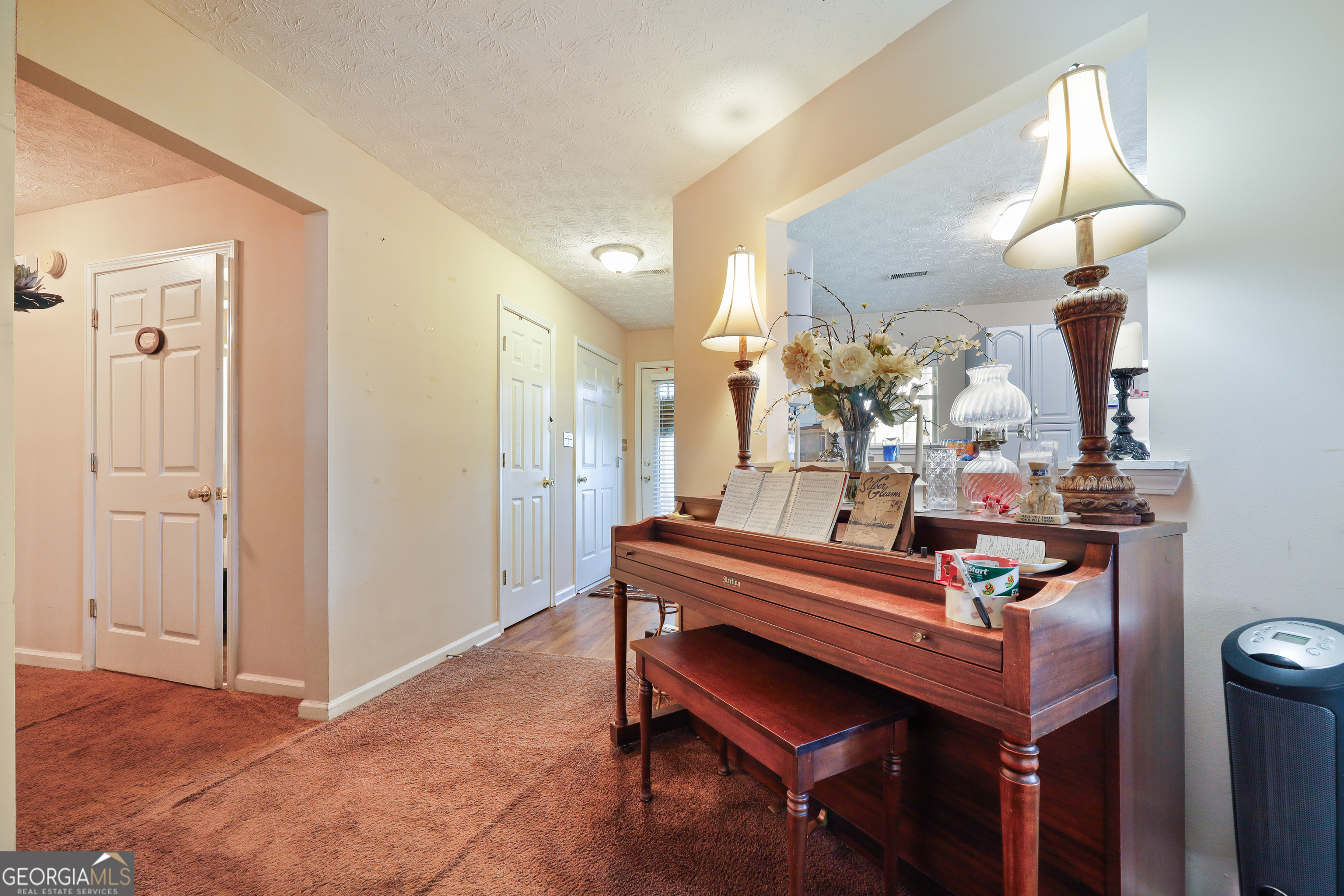 2433 Bear Creek Road Statham, GA 30666 - Photo 15 of 58 a view of a dining room with furniture