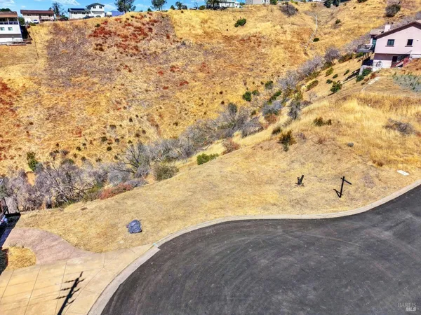 a view of a backyard of a house