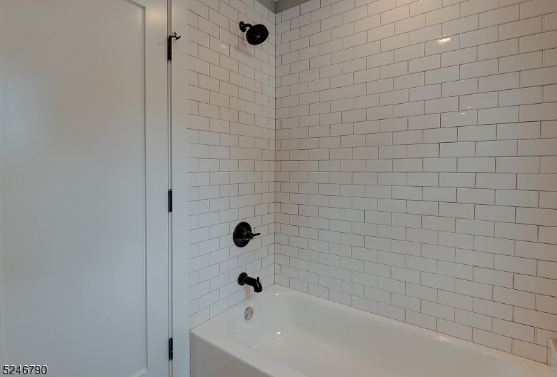 81 Mission Street, Unit 1 Montclair, NJ 07042 - Photo 13 of 19 a bathroom with a bathtub