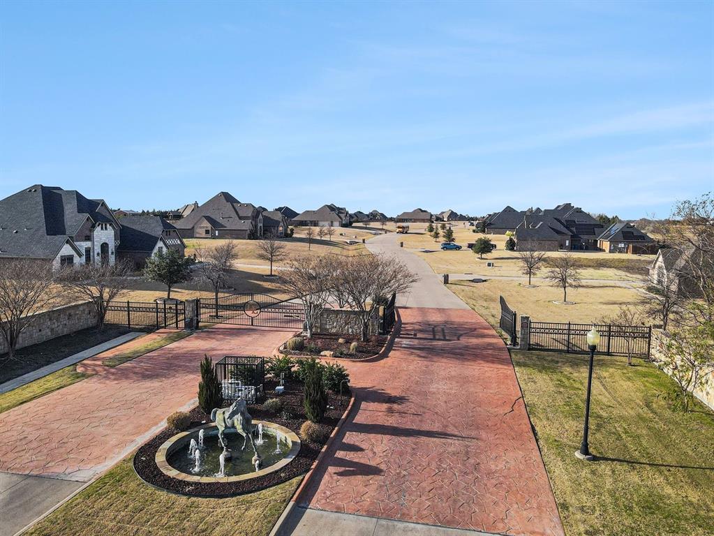 415 Silver Spur Trail Rockwall, TX 75032 - Photo 39 of 40 a view of a swimming pool with lounge chair