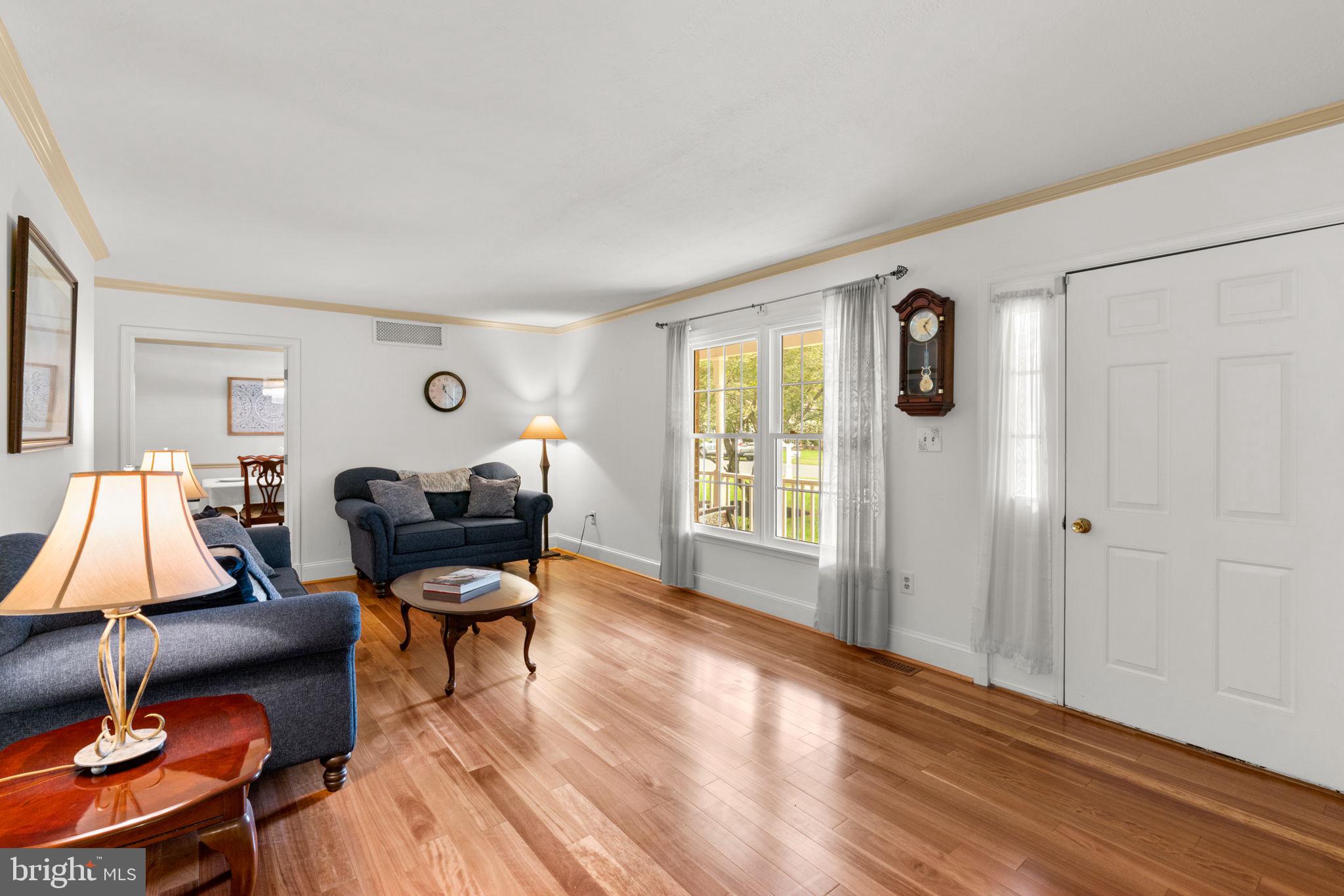 7884 Walnut Grove Road Severn, MD 21144 - Photo 18 of 42 a living room with furniture and a window