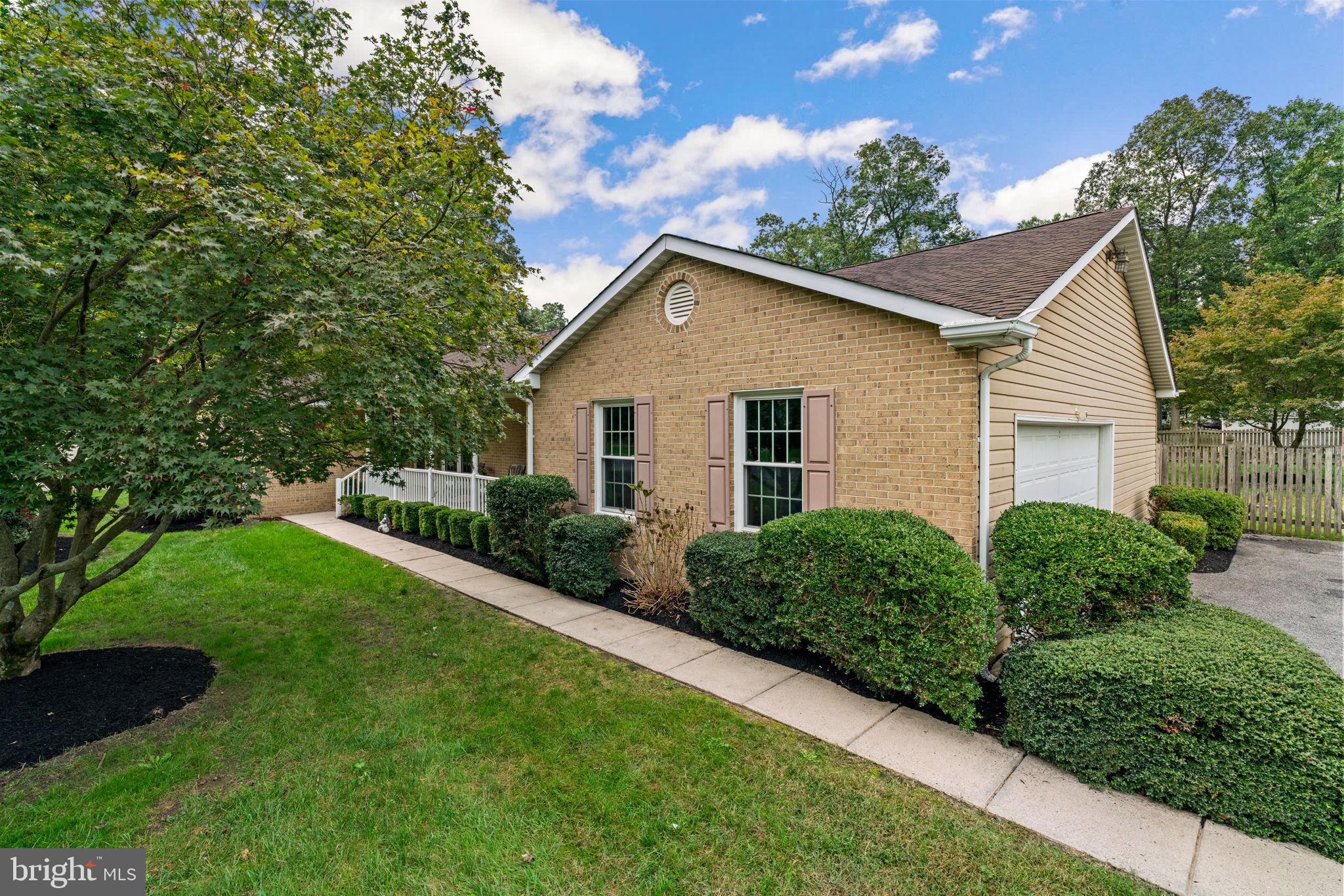 7884 Walnut Grove Road Severn, MD 21144 - Photo 2 of 42 a house that has a lot of plants in it