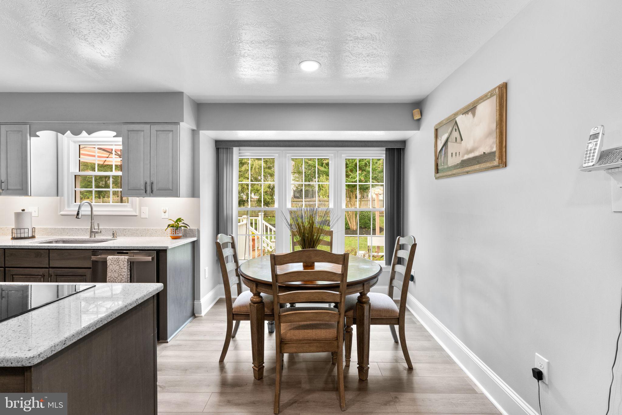 7884 Walnut Grove Road Severn, MD 21144 - Photo 10 of 42 a view of a dining room with furniture and window