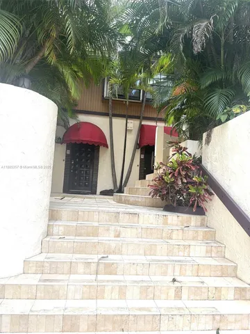 a view of swimming pool with a patio