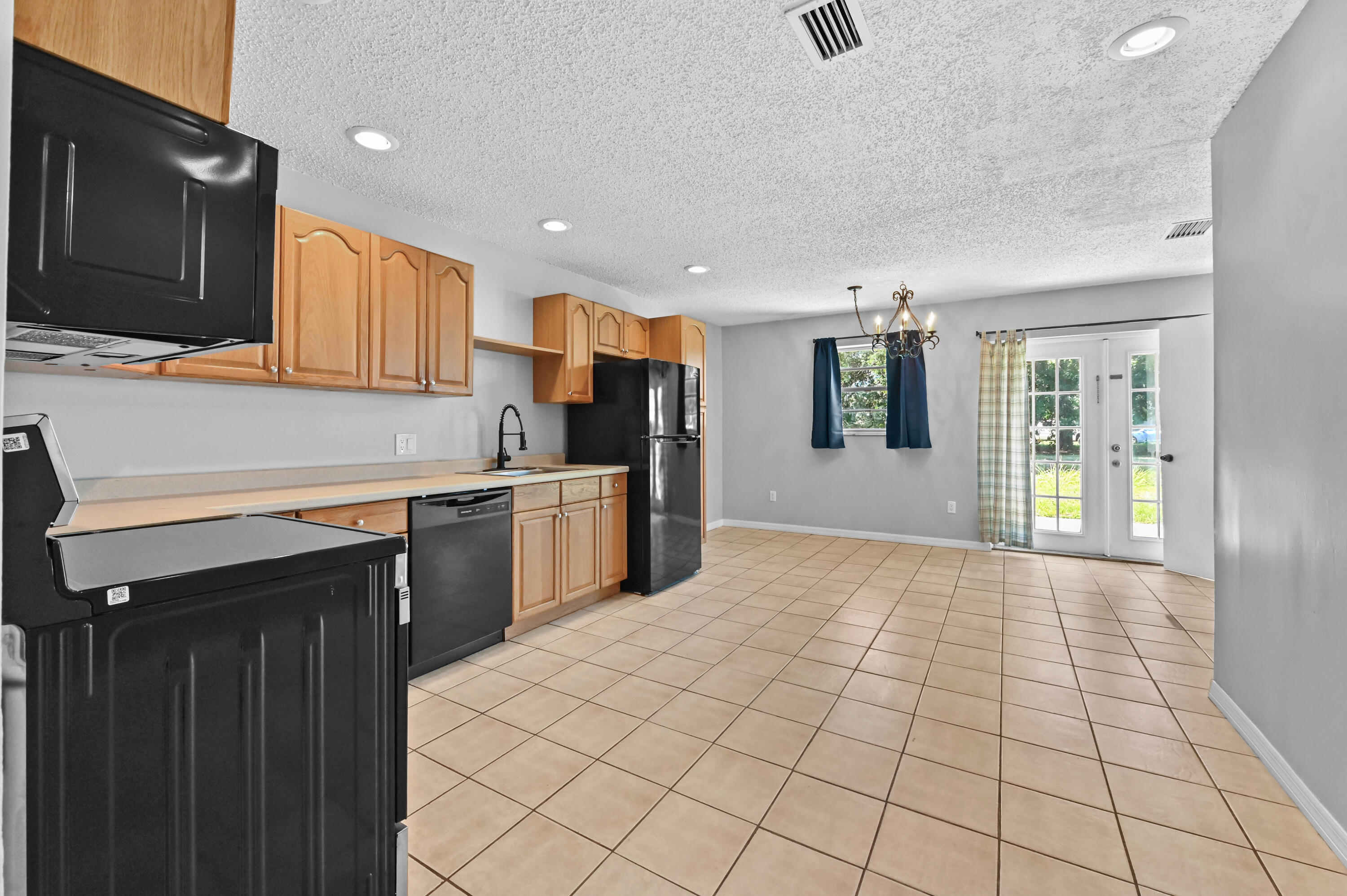 4548 Southeast Salvatori Road Stuart, FL 34997 - Photo 9 of 30 05 kitchen 01