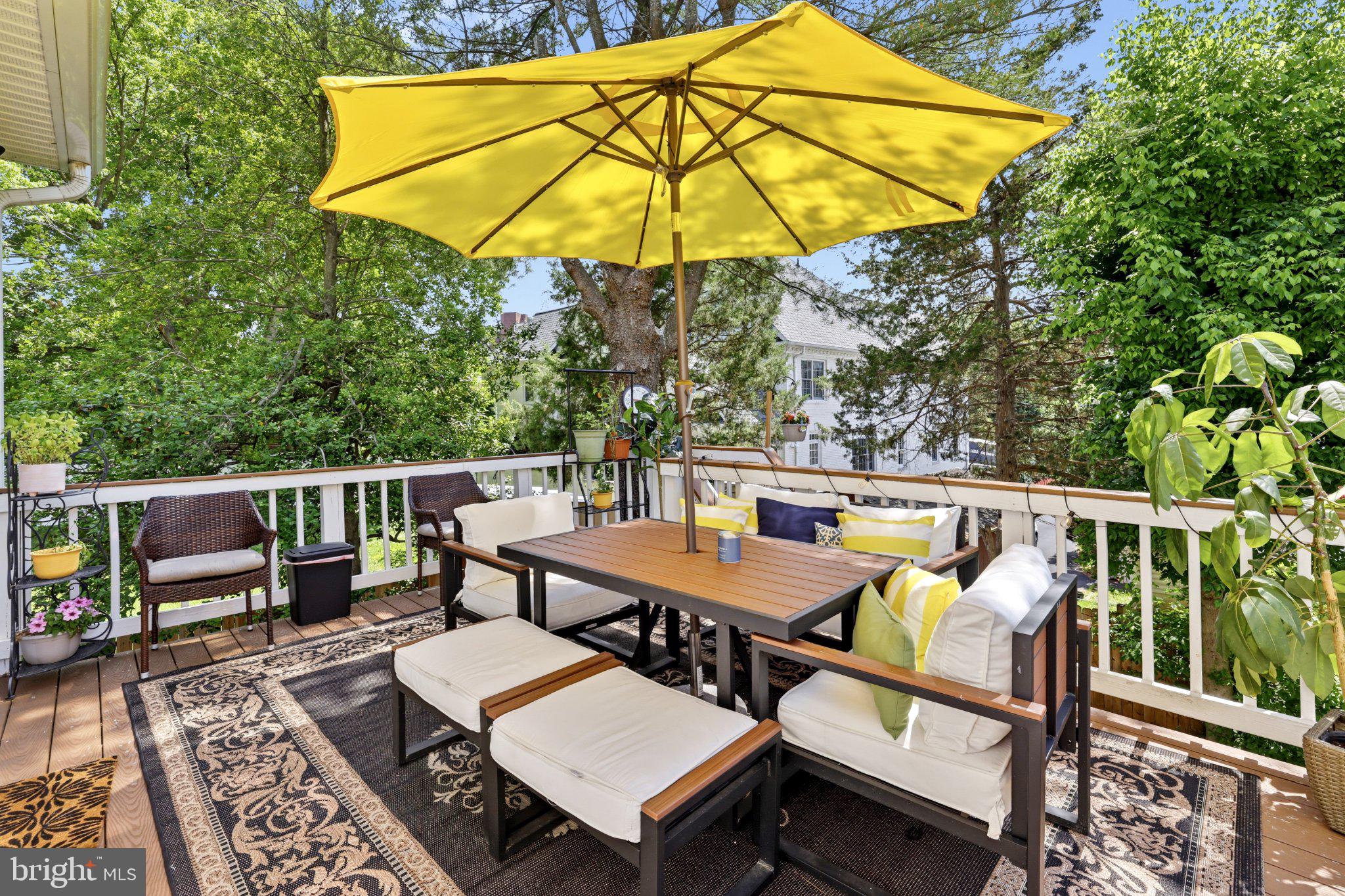 6732 Churchill Road McLean, VA 22101 - Photo 52 of 61 Sunny patio oasis with vibrant umbrella.