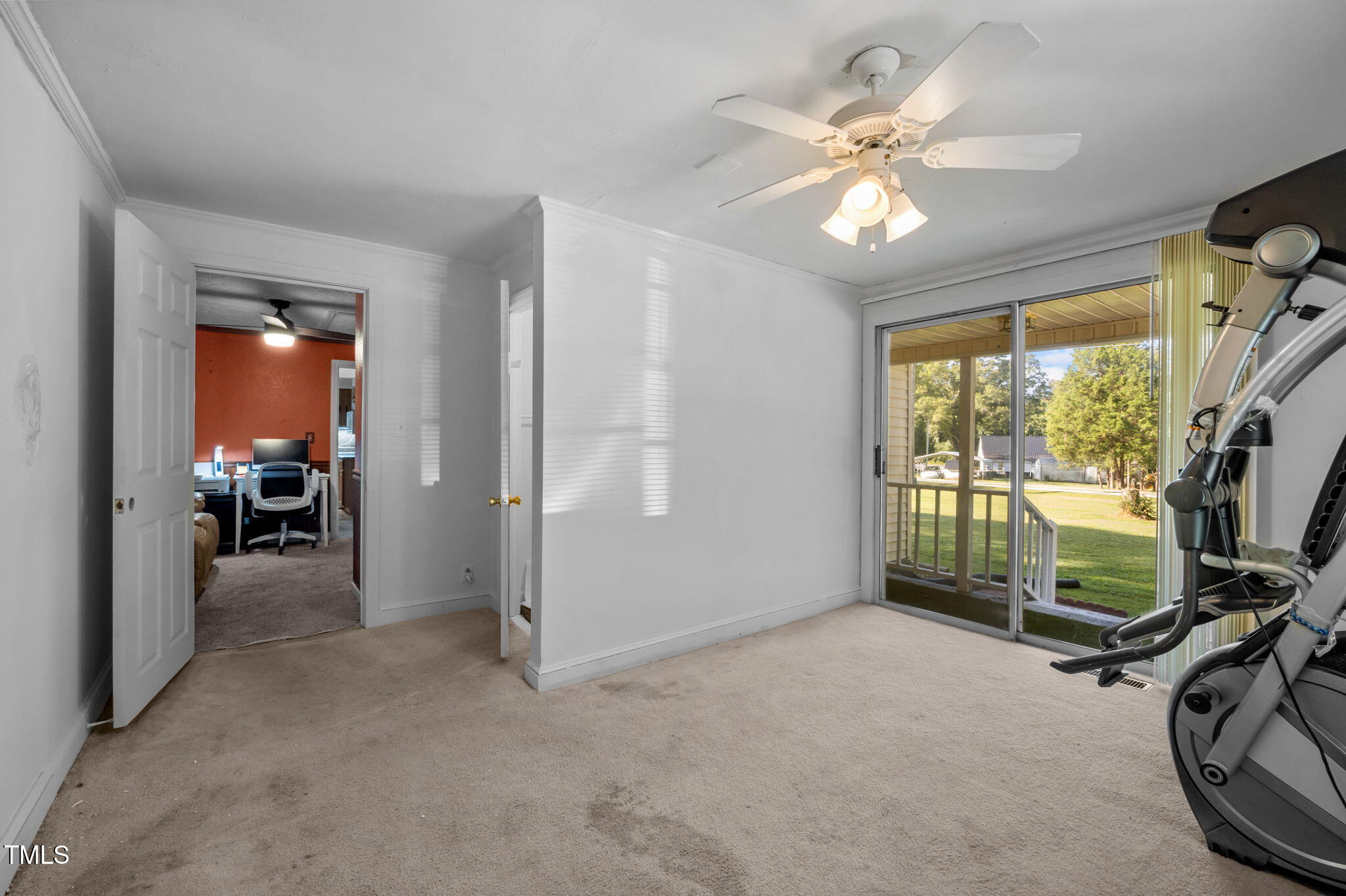 122 Old Surl Road Roxboro, NC 27574 - Photo 18 of 35 a view of a livingroom with a ceiling fan and a window