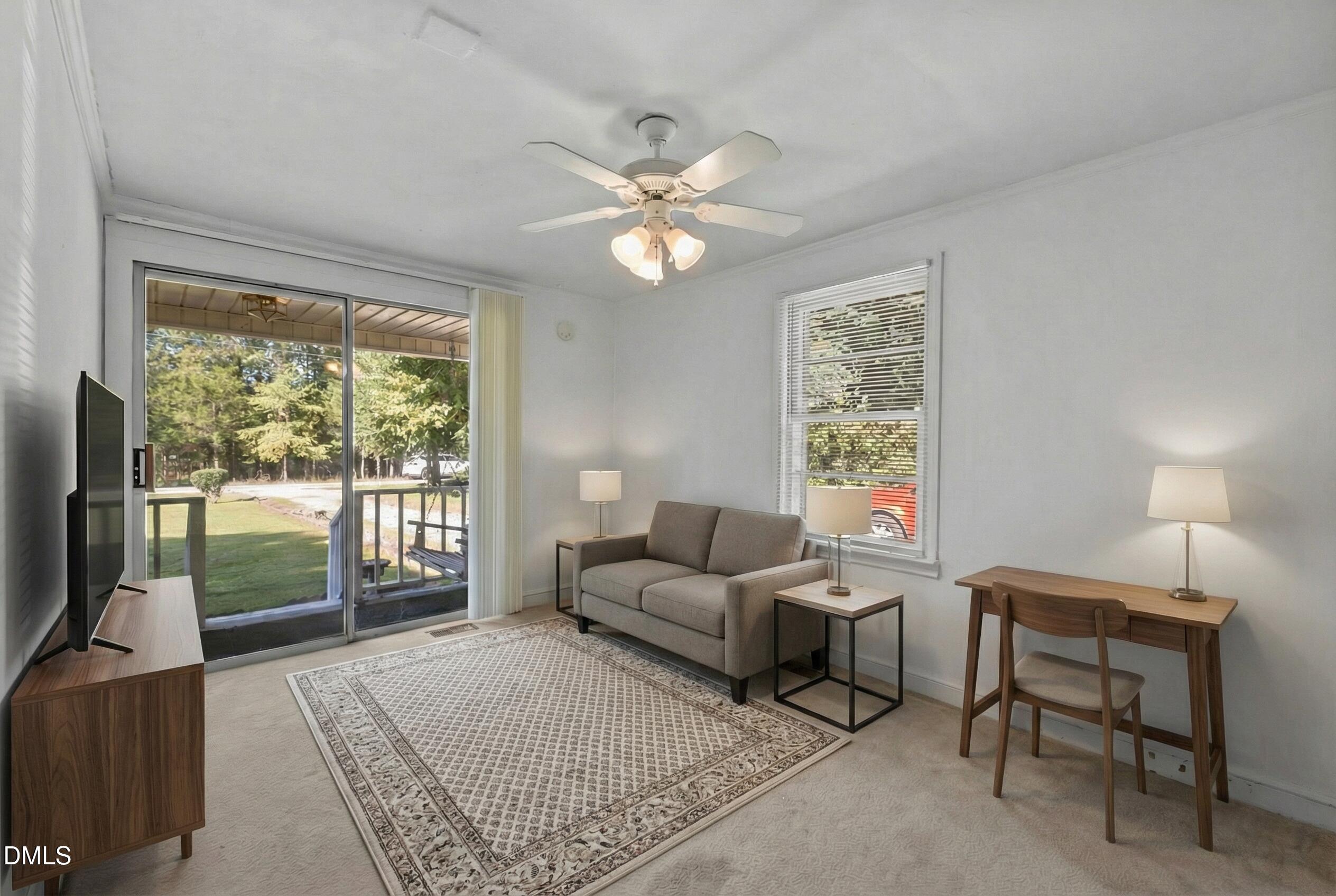 122 Old Surl Road Roxboro, NC 27574 - Photo 19 of 35 a living room with furniture and a window