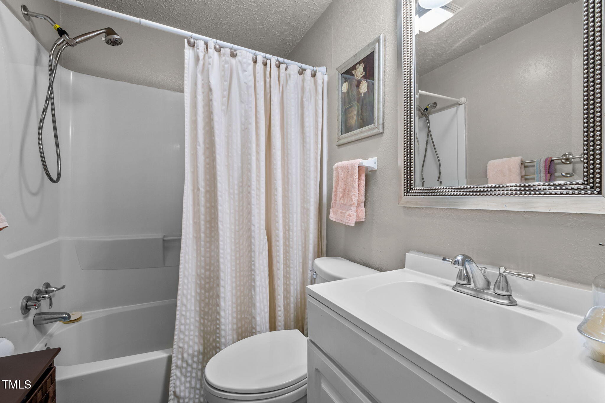 122 Old Surl Road Roxboro, NC 27574 - Photo 21 of 35 a bathroom with a sink toilet and shower