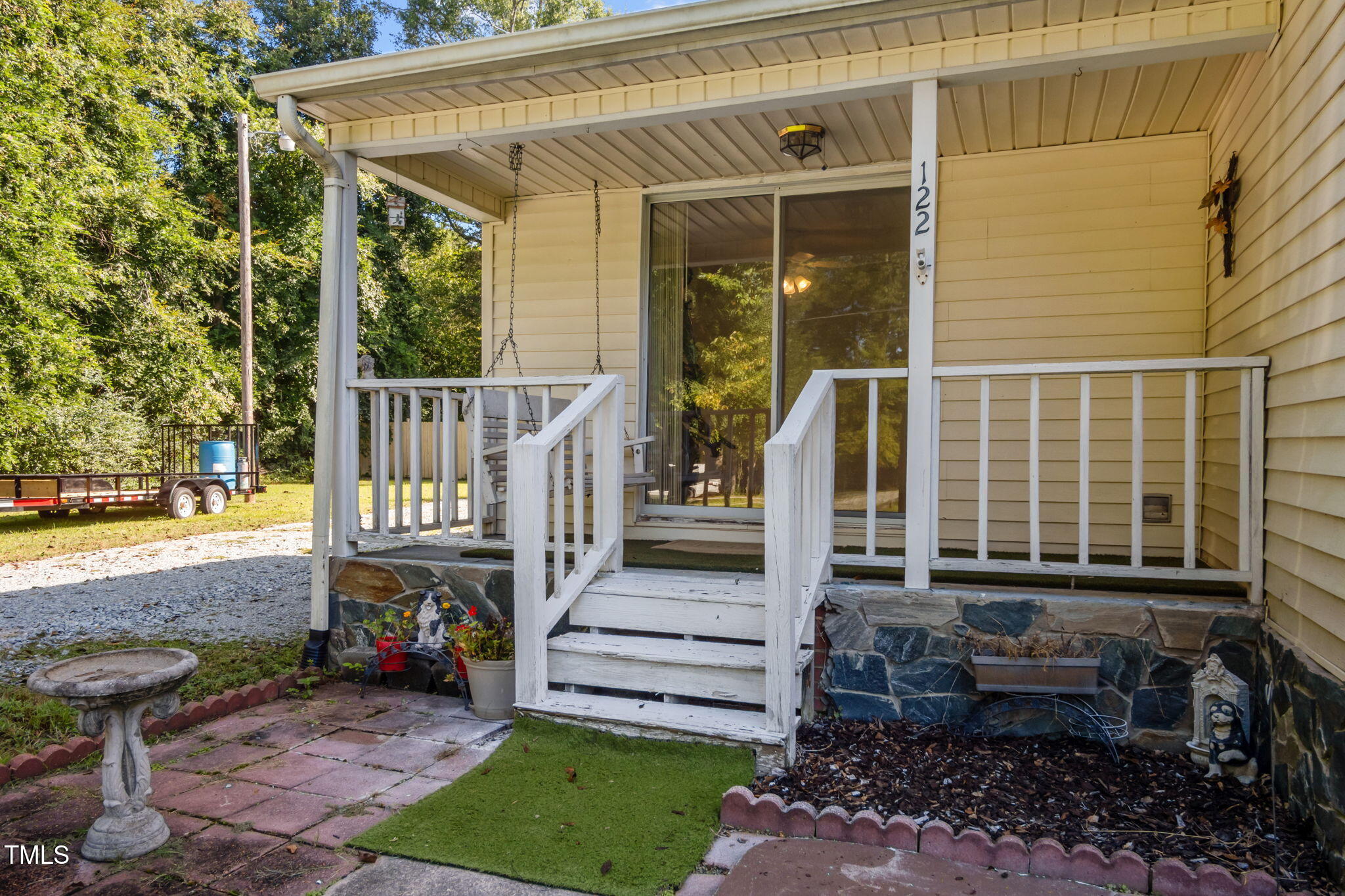 122 Old Surl Road Roxboro, NC 27574 - Photo 22 of 35 a view of a house with wooden floor and a yard