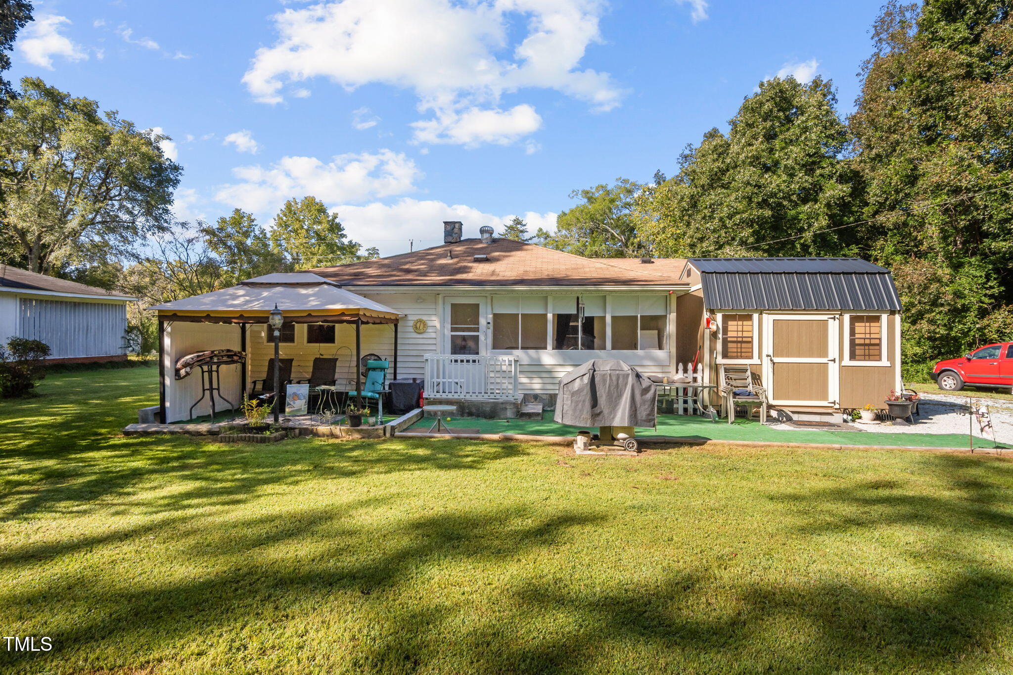 122 Old Surl Road Roxboro, NC 27574 - Photo 27 of 35 a view of a house with swimming pool and sitting area