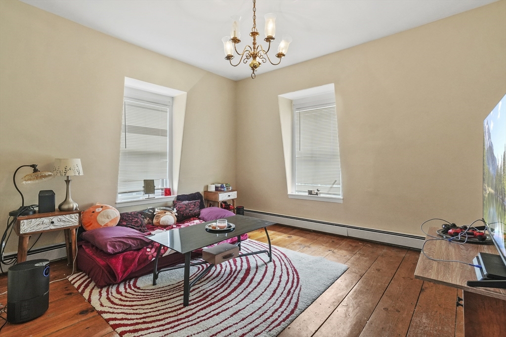 6 Prospect Street Merrimac, MA 01860 - Photo 26 of 40 a living room with furniture and wooden floor